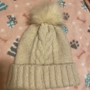 Express Pom Pom beanie.